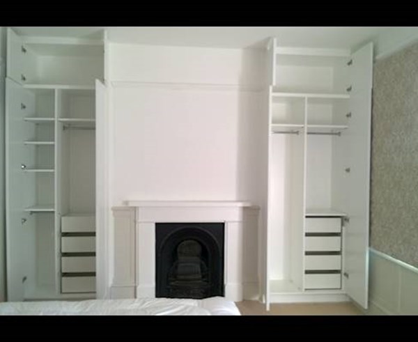 Double fitted wardrobes with drawers.jpg